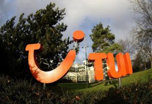 The logo of Germany's TUI AG is pictured outside the TUI Deutschland GmbH headquarters in Hanover January 22, 2008.  Picture taken January 22, 2008. REUTERS/Christian Charisius (GERMANY)