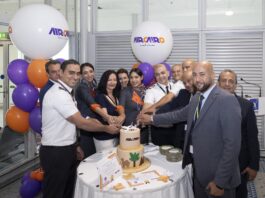 AIRCAIRO crew and Athens International Airport staff cut a ceremonial cake to mark the airline's inaugural flight to Athens.