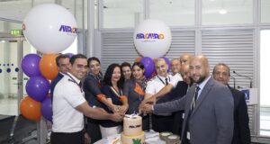 AIRCAIRO crew and Athens International Airport staff cut a ceremonial cake to mark the airline's inaugural flight to Athens.
