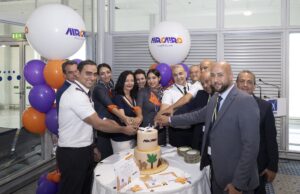 AIRCAIRO crew and Athens International Airport staff cut a ceremonial cake to mark the airline's inaugural flight to Athens.