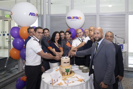 AIRCAIRO crew and Athens International Airport staff cut a ceremonial cake to mark the airline's inaugural flight to Athens.